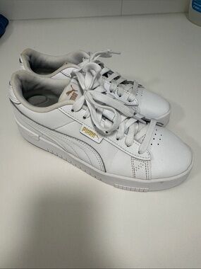 Puma White Sneakers with Gold Logo Accents